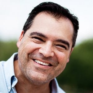 A man with a younger looking smile