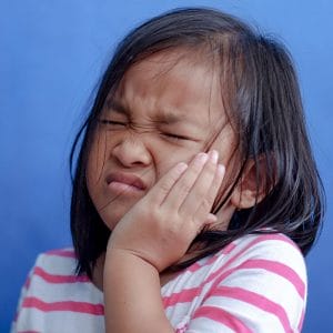 Young child has a toothache