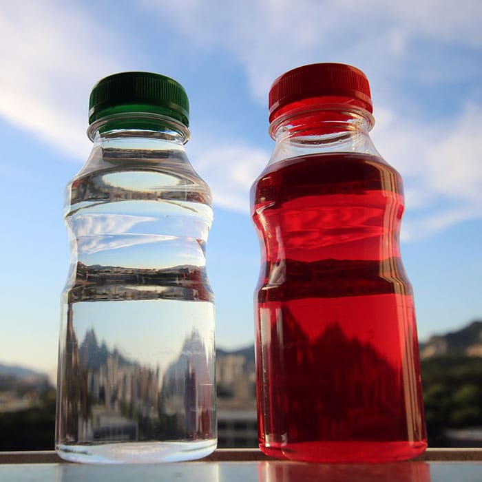 Two bottles of sugary drinks that can damage your oral health